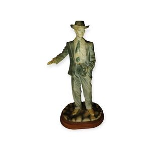 Elegant Green and Brown Figurine